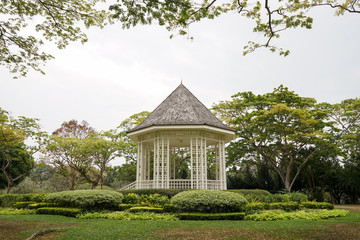 Fototapeta na wymiar Gazebo or white bandstand at Singapore Botanic Gardens