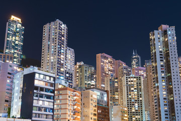 high rise residential building in Hong Kong city at night