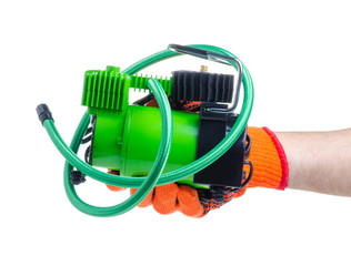 Pump car compressor in hand on white background isolation