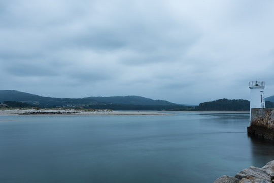 Long exposure photo of a lighthouse on the Spanish coast