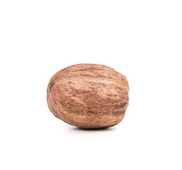 flavorful nutmeg on an isolated white background.
