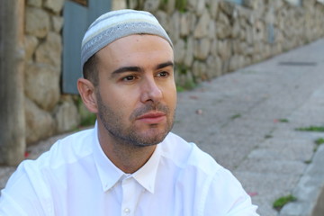 Handsome Islamic man looking away