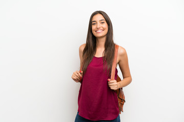 Young woman over isolated white background with backpack