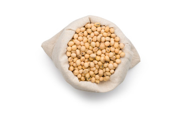 Top view of Soybeans in a sack bag isolated on white background with clipping path.
