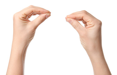 Hands of woman on white background