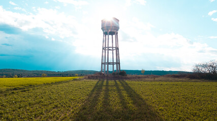 water tower and sky - Powered by Adobe
