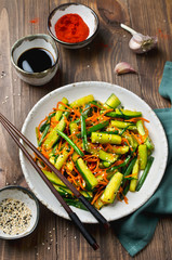 Cucumber salad with carrots and sesame seeds