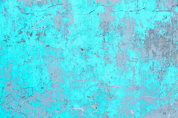 Texture of an old plastered wall painted with blue and white paint.
