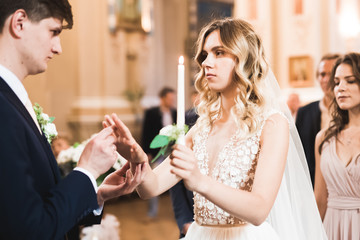 Wedding couple bide and groom get married in a church