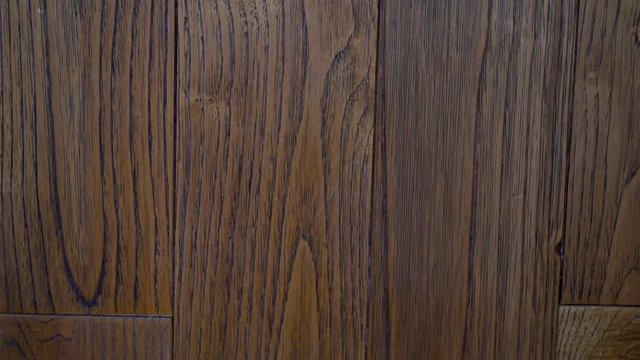 Close-up beautiful solid wood floor Board walnut sliding camera
