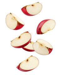 Falling Red apple slice isolated on white background, clipping path, full depth of field