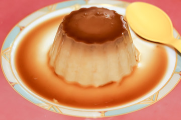 Fluffy moist Vanilla Yellow Cake with Chocolate Frosting, a baked pastry item, the perfect Birthday Homemade Cake, a homemade grandmother's recipe.