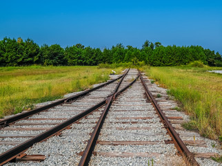 Fototapeta premium Railroad Tracks Crossing in an abandoned train yard