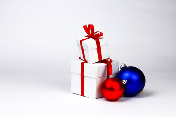 Gift boxes and Christmas tree toy balls. New Year and Christmas holydays concept. Part of set.