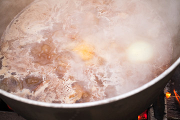 Boiling hot broth with beef