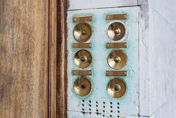 Vintage antique brass metal doorbells panes door entrance
