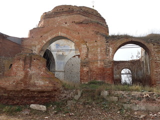 Destroyed old brick building of a castle or fortress.