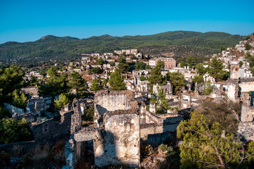 Fototapeta premium Ruins of Kayakoy Village in Fethiye Town, Kayakoy Village is old abandoned historical Greek village