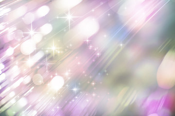 Stars and stardust on soft light pastel bokae blurred background, Christmas holidays background...