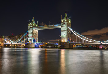 Tower bridge and river Thames in London at dusk
