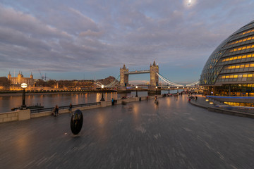Tower bridge and London City Hall at dusk