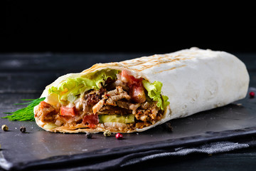 Mexican beef steak burritos with vegetable - obrazy, fototapety, plakaty