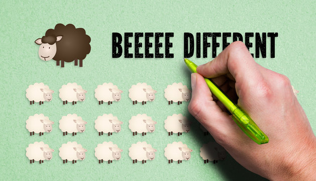 hand is drawing black sheep and the message "beee different" with many white sheeps 