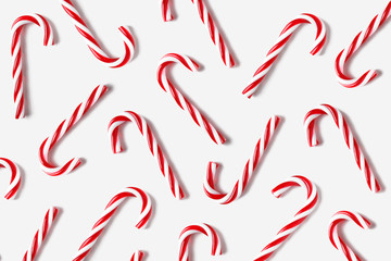 Seamless pattern of Christmas candy cone on white background.