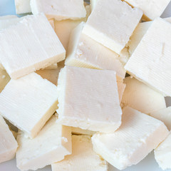 Paneer or cottage cheese cube close up, slice pieces of homemade fresh raw panner.