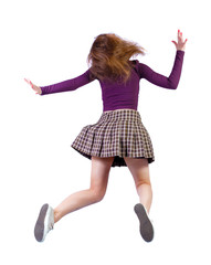 Back view of girl in a jump.