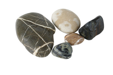 Several sea stones lie on a white isolated background.