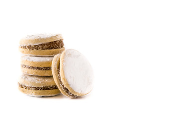 Traditional Argentinian alfajores with dulce de leche and sugar isolated. Copy space