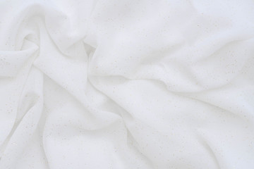 Luxury cloth texture with white fabric of silk for backdrop, wedding background. Seamless pattern of satin cotton.