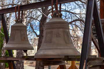 Fototapeta premium Two bronze church bells of different sizes