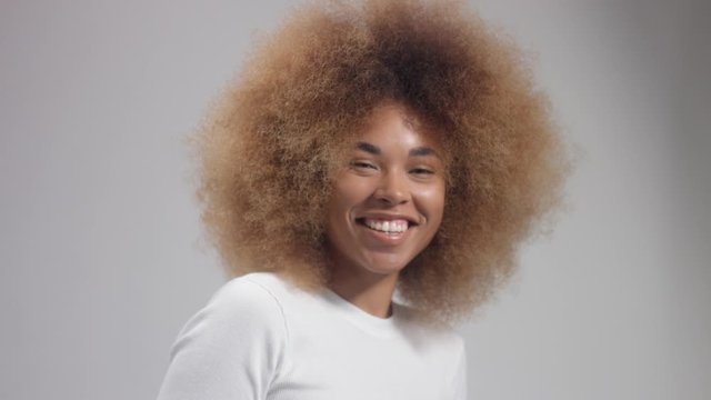 happy smiling and laughing mixed race black model