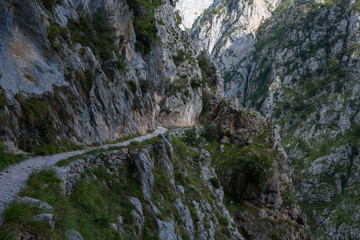Care route with path to the edge of the cliff in the peaks of Europe