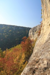 Fototapeta premium View of the autumn forest from the height of Hankrumski manastir (Shumen plateau, Bulgaria)