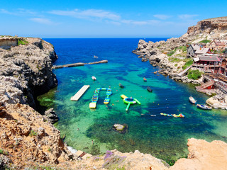 Beautiful Anchor Bay with azure and clear water. Malta.