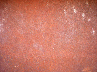 Fototapeta premium Textural background of an old, rusty metal sheet in red