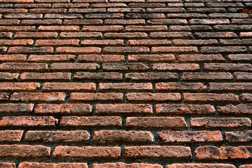 Closeup pattern of old and grunge red brick wall