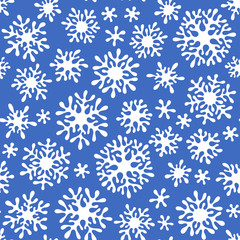 Christmas seamless doodle pattern with snowflakes