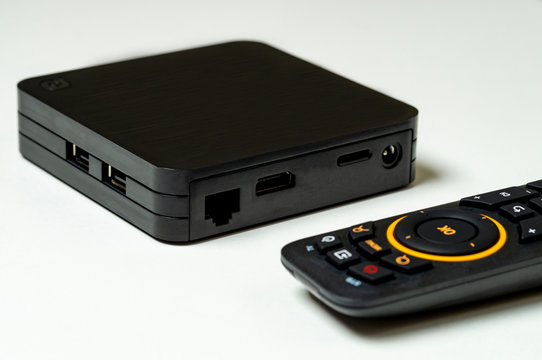 TV set-top box on a white background, selective focus