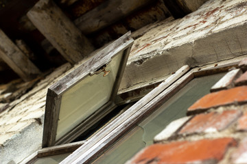 Fototapeta na wymiar old open window wall brick house