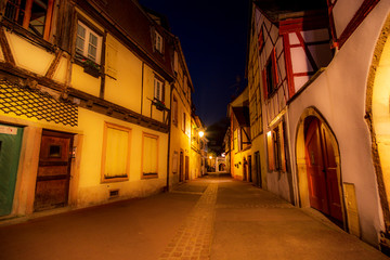 Fototapeta na wymiar Beautiful night view in Petite Venice with traditional half timbered houses, Colmar, Alsace, France