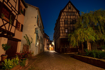 Naklejka na ściany i meble Beautiful night view in Petite Venice with traditional half timbered houses, Colmar, Alsace, France