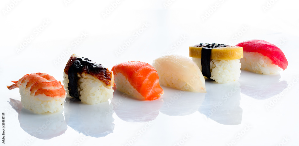 Sticker rows of fresh japanese nigiri on a light background