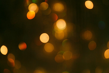 Fototapeta premium abstract lights in defocus. Background for Christmas advertising, Christmas conceptual background with beautiful blurry lights.