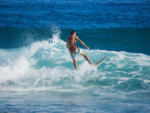 Man surfing in the Atlantic Ocean.