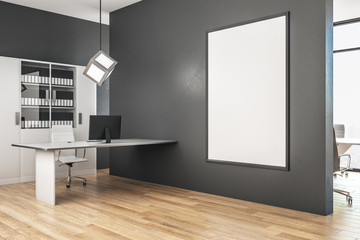 Bright office interior with poster