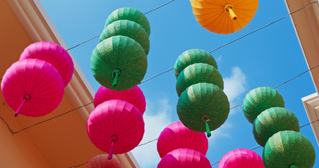 Colorful chinese style lantern hanging outdoor under clear blue sky for Lunar new year - Powered by Adobe